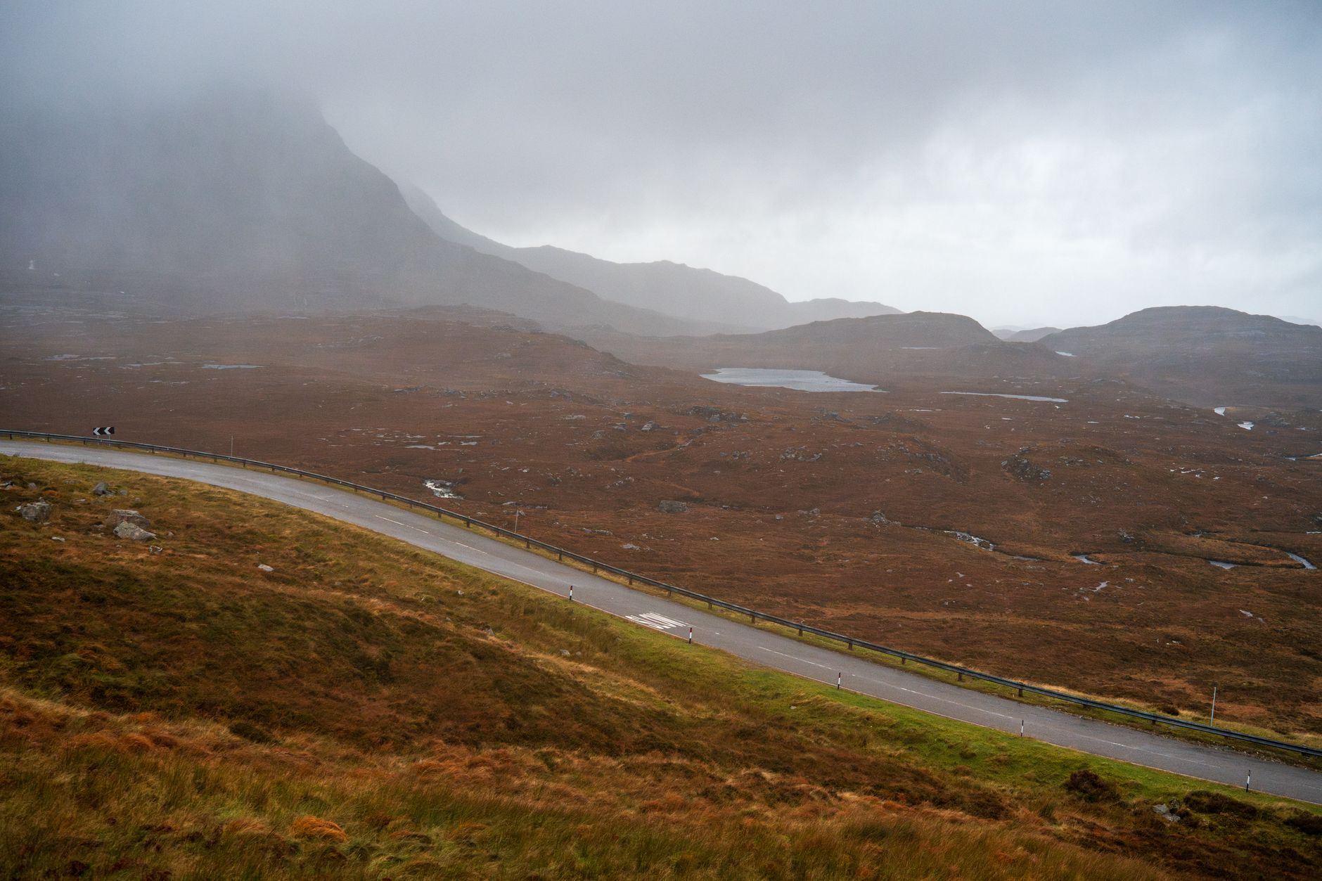 Winding Scottish mountain road perfect for Welsh and Scottish driving roads exploration