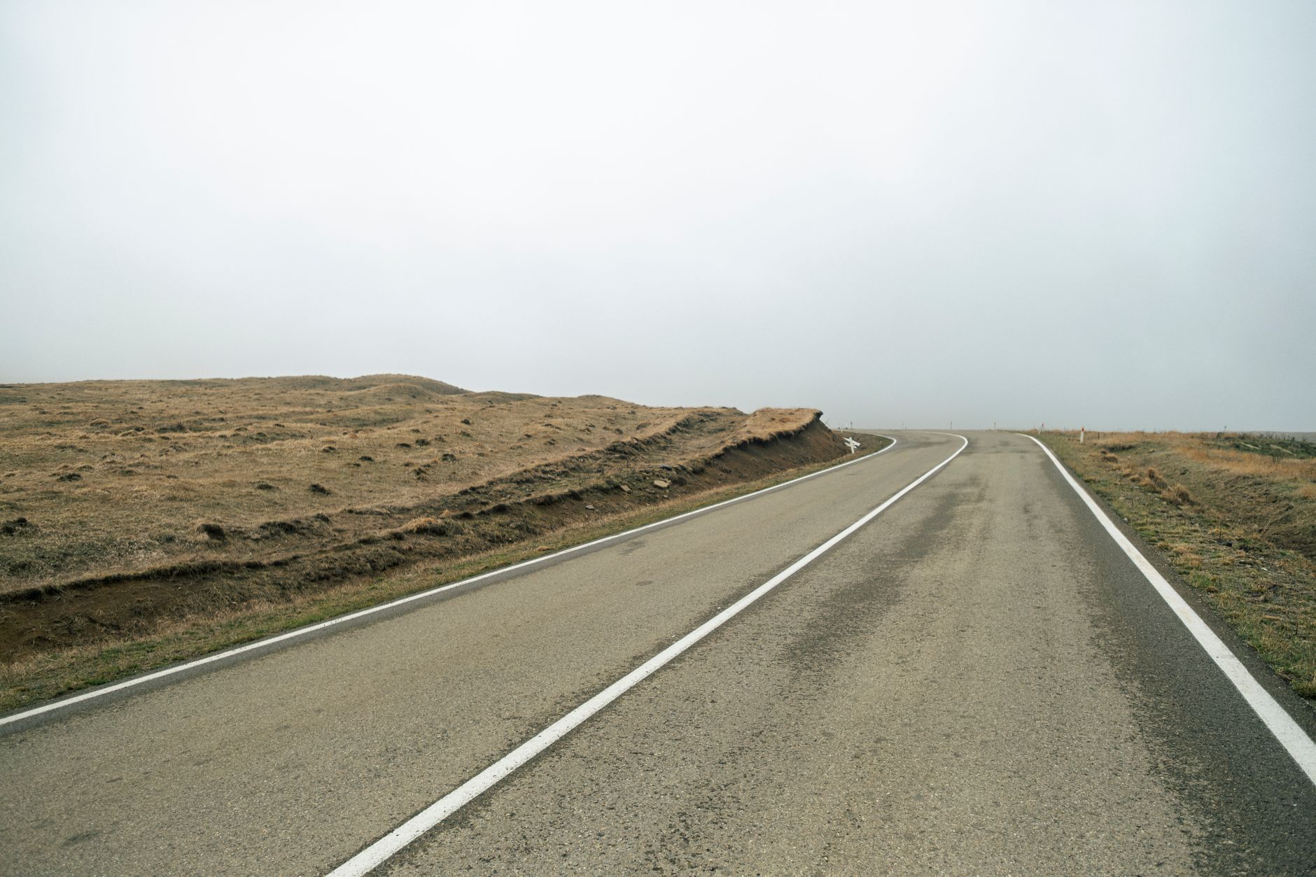 Empty moorland driving road in Yorkshire, one of the best driving roads UK hidden gems