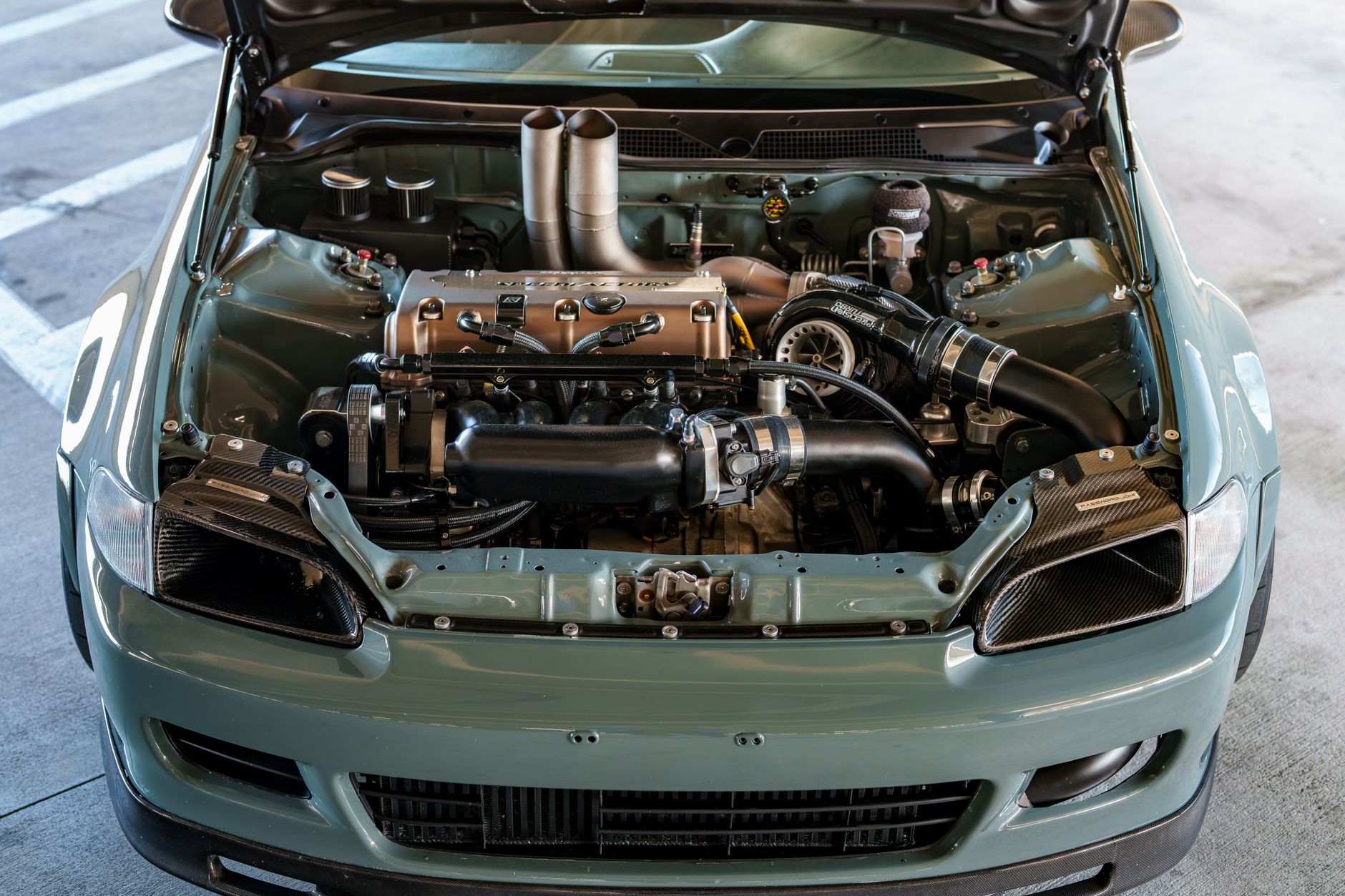 Mitsubishi Evo engine bay detail showing turbo, key inspection point for Mitsubishi Evo classic car buyers in the UK